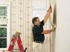 How can wallpaper fixing services give a great look of walls in home?